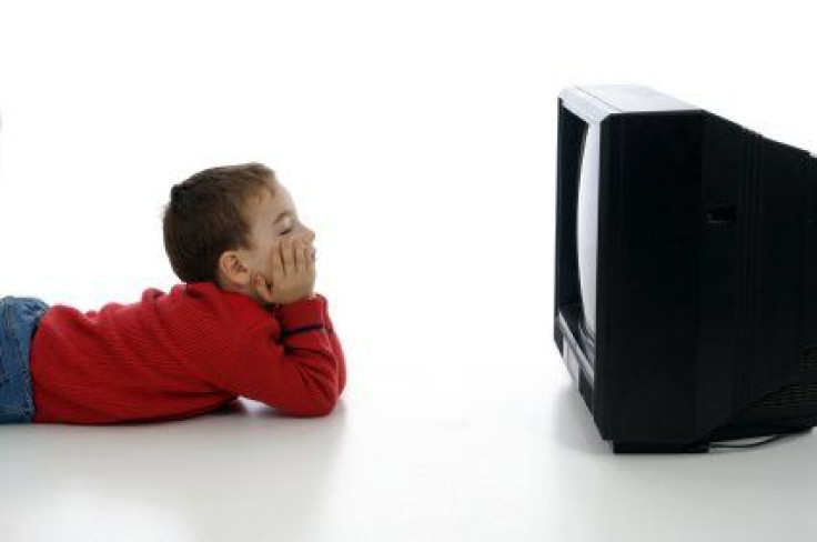 Kid Watching TV Commercials