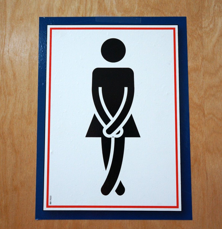 Women's restroom sign.
