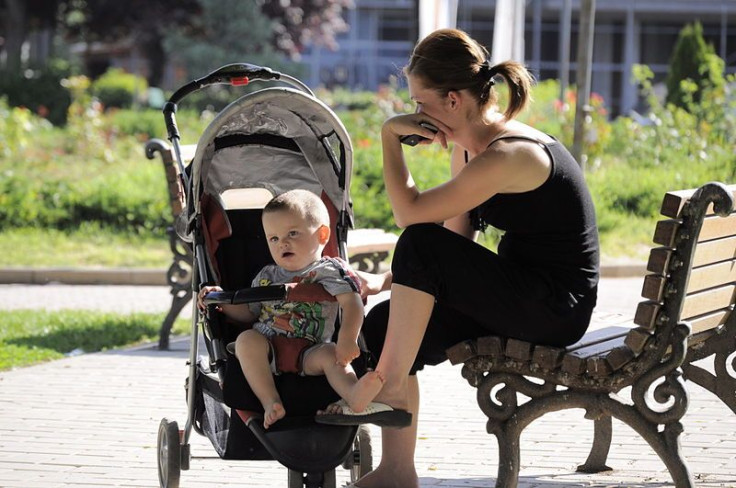 Young mother and her child at the park.