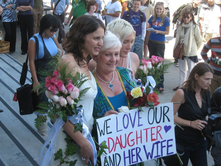 Same-sex couple marries.