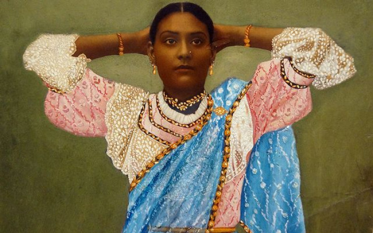 Painted photograph of a prostitute from India (At the Royal Ontario Museum).13 years of peer-based, HIV prevention programs for female sex workers reduced both HIV and syphilis in young pregnant women from southern India. 