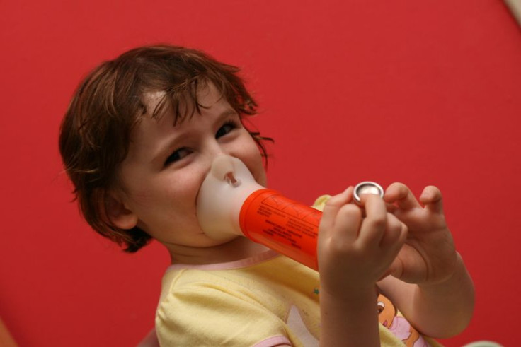 Child with an asthma inhaler