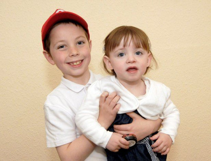 Harry Flynn has been giving his little sister Isabelle life-saving resuscitation since she was just eight-weeks-old. (SWNS)