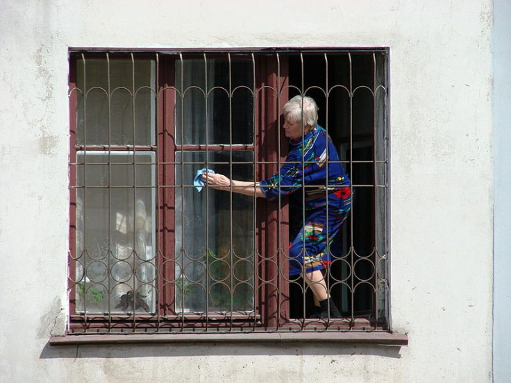Woman cleaning windows