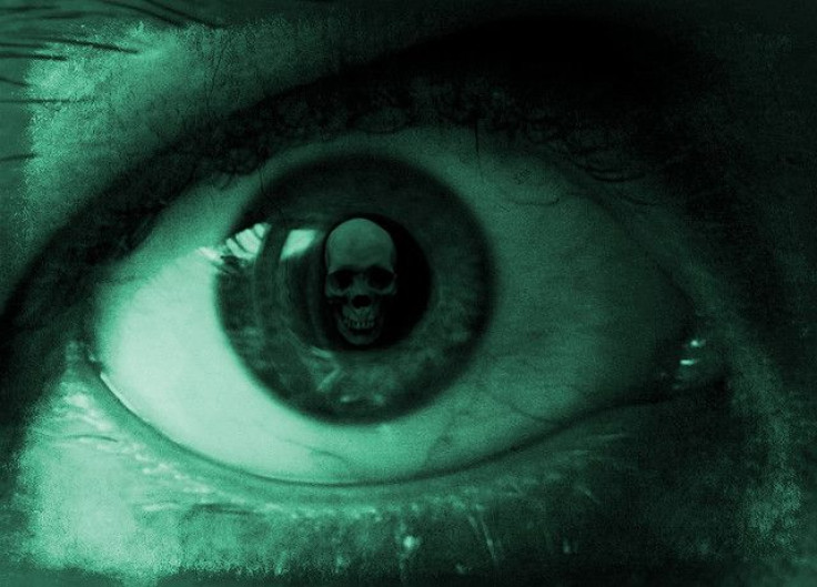 An eyeball with death reflected in it.