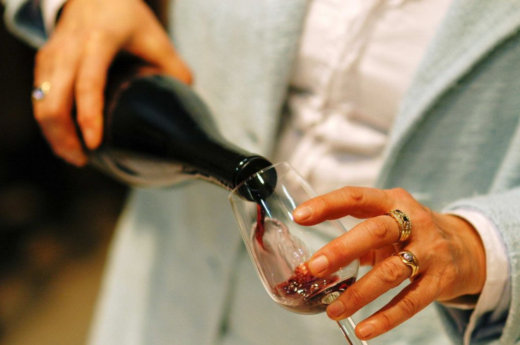 Pouring glass of red wine