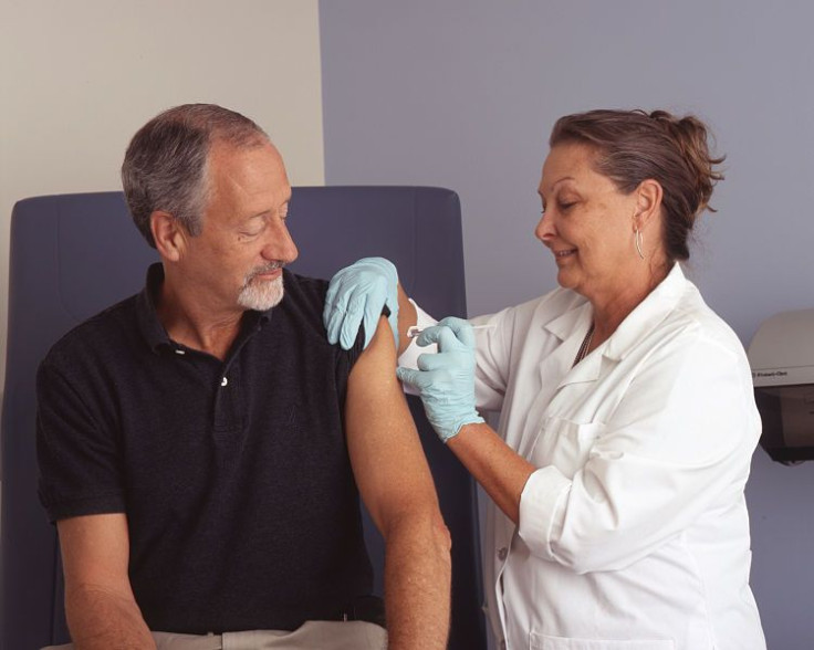 Man getting vaccine from nurse