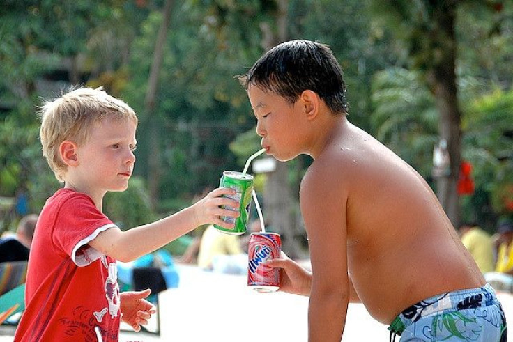 Kids drinking sugary drinks