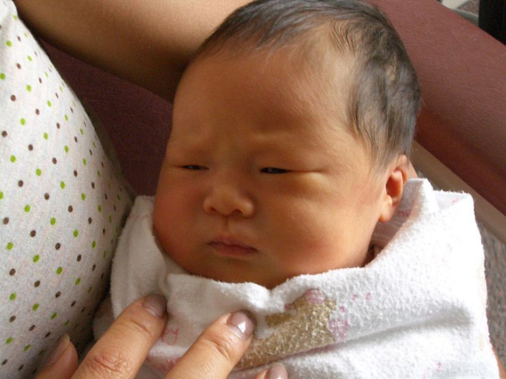 Chinese Baby Ready for Bottle