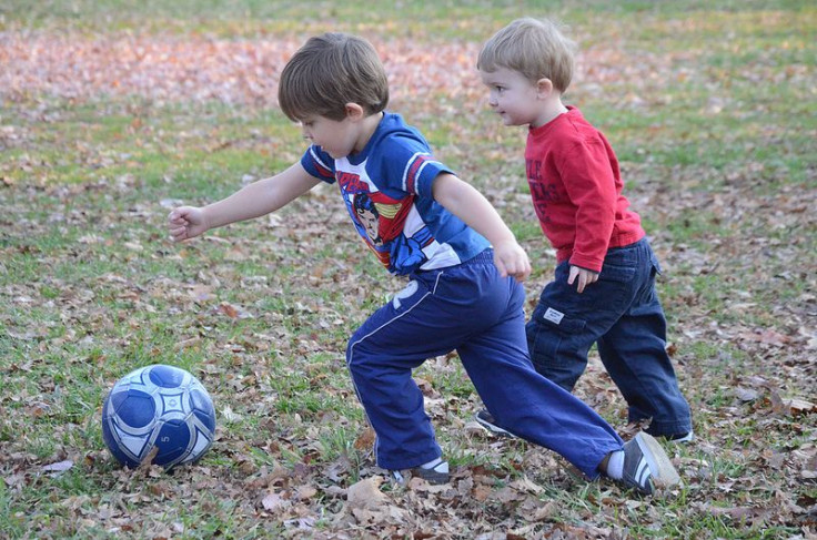 children playing soccer