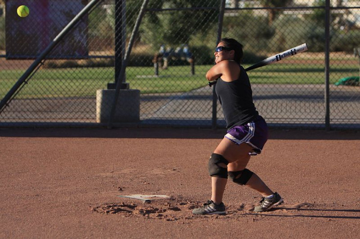 Lance Cpl. Katherine Smith prepared to smash it to the outfield during the All-Marine Women's Softball Team screening July 29 at Felix Field.