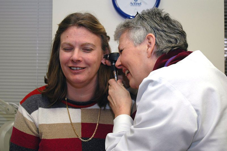 Doctor examines patient