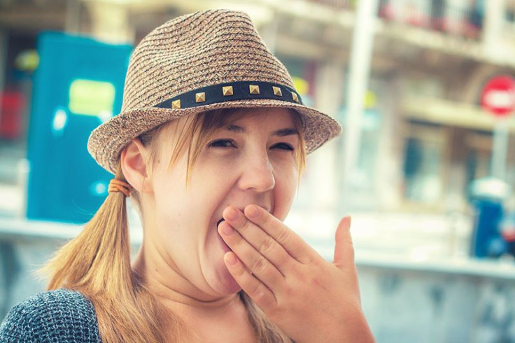 Girl yawning