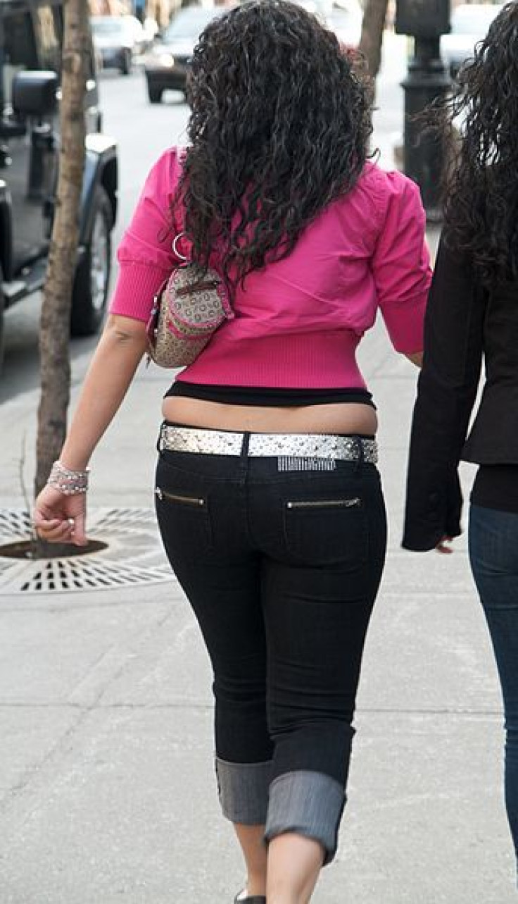 Woman wearing tight belt