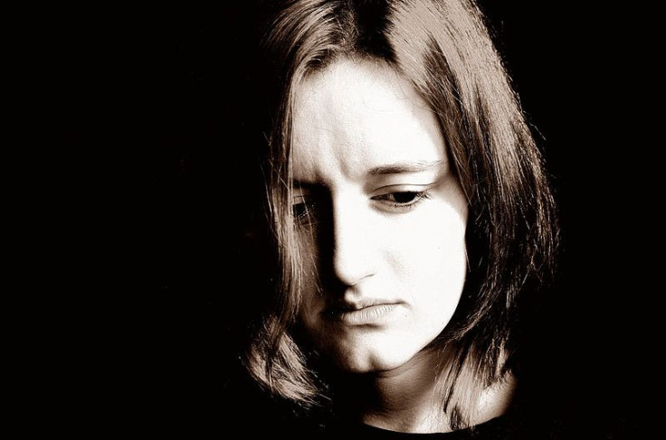 A woman grieving