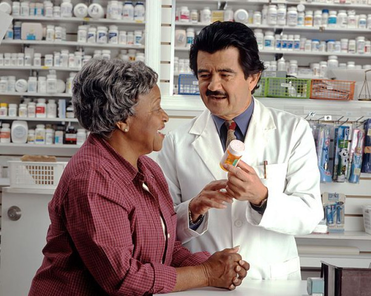 Woman consults with pharmacist