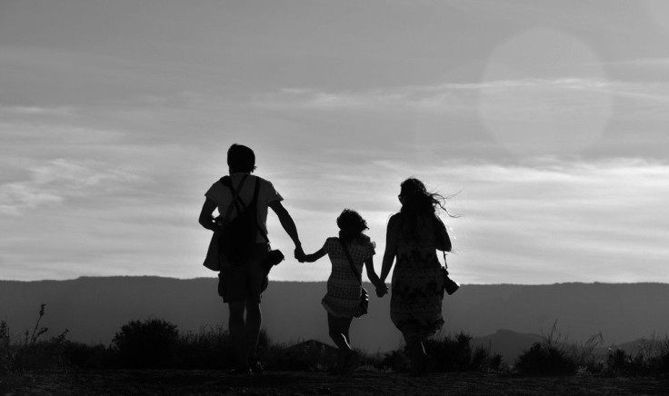 Photo of a family on a beach