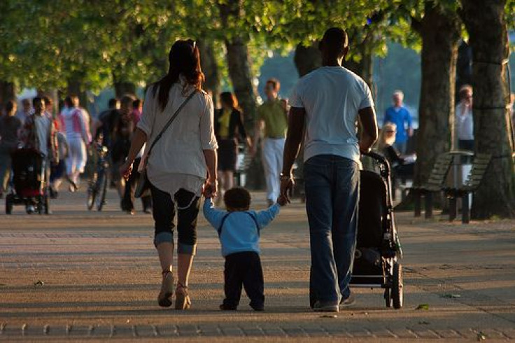 Couple walking with child