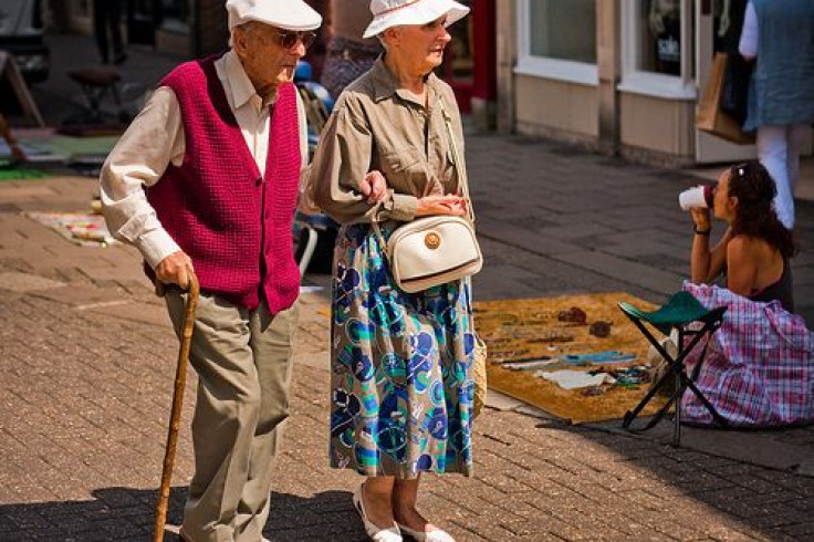 Elderly couple walking