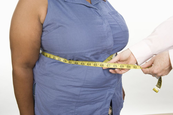 Obese woman being measured