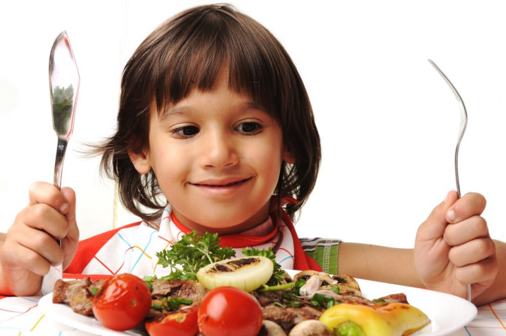 Boy getting ready to eat large plate