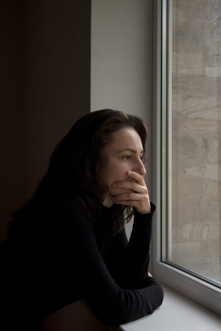 shutterstock photo of anxious woman