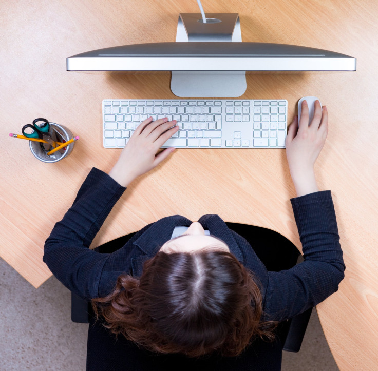 sitting at desk