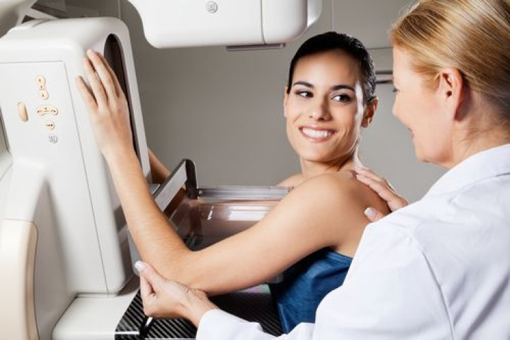 Woman undergoing mammogram 