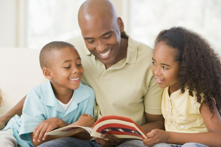 Dad reading a story to his kids