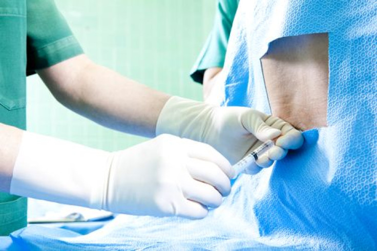 Patient receives back injection