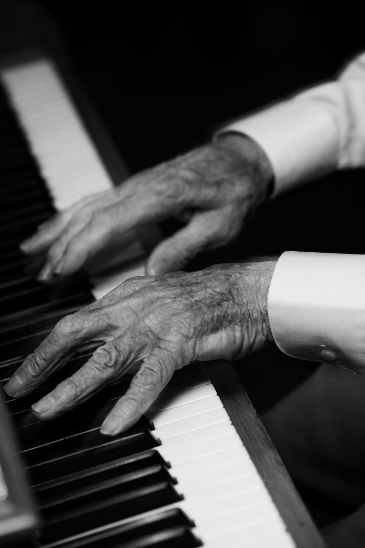 shutterstock photo of old piano player