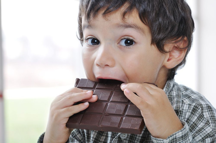 kid eating chocolate
