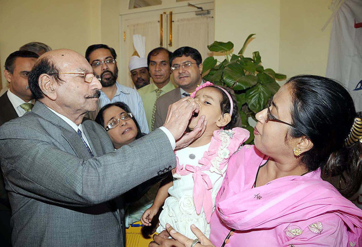 administering polio vaccine drop