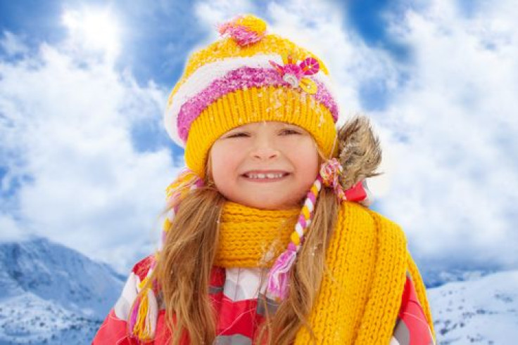 Girl dressed in yellow clothing during winter