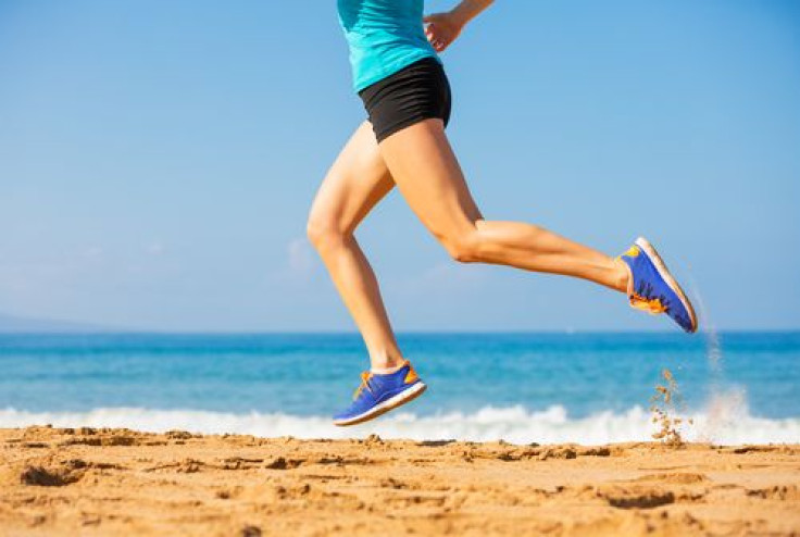 Woman running on the beach