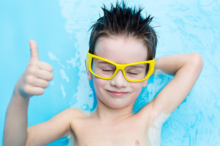 kid peeing in pool