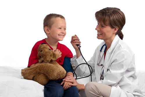 Preschooler getting checkup at the doctor