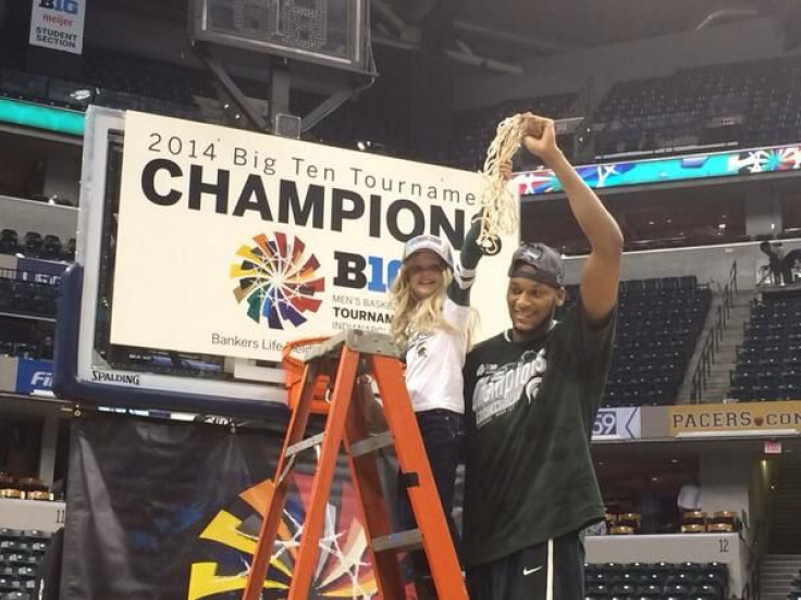 Holsworth with Payne on the basketball court