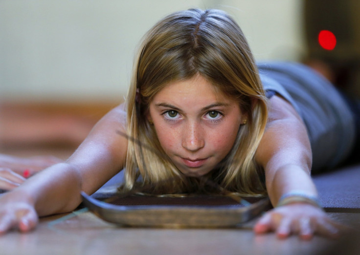 Jaysea Devoe practicing yoga