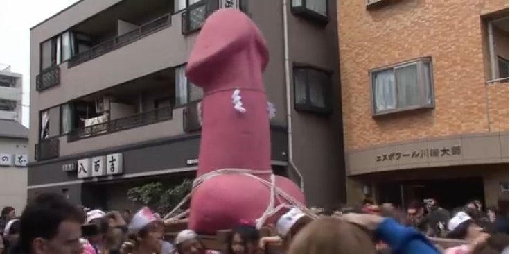 Giant penis being carried on huge altar