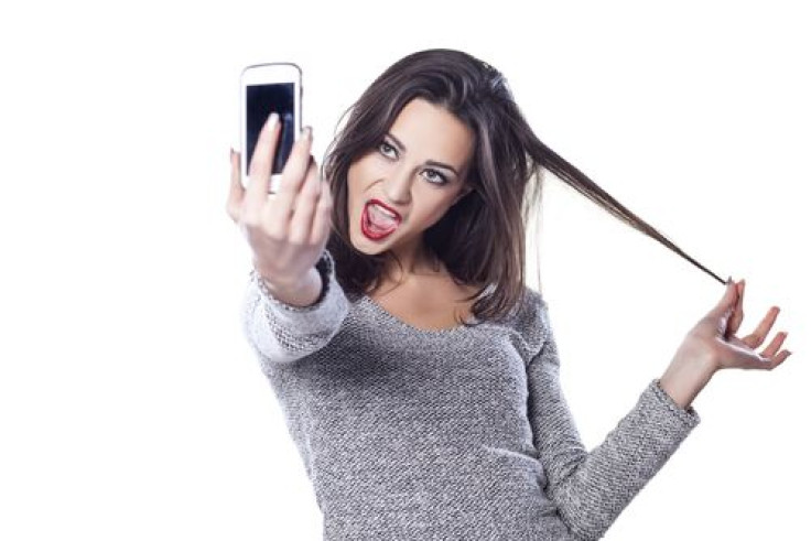 Woman taking a selfie of herself
