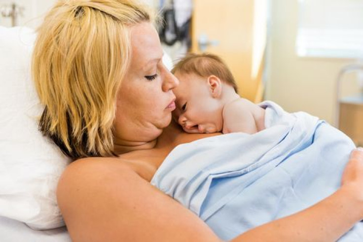 Mother practicing skin-to-skin time with newborn baby