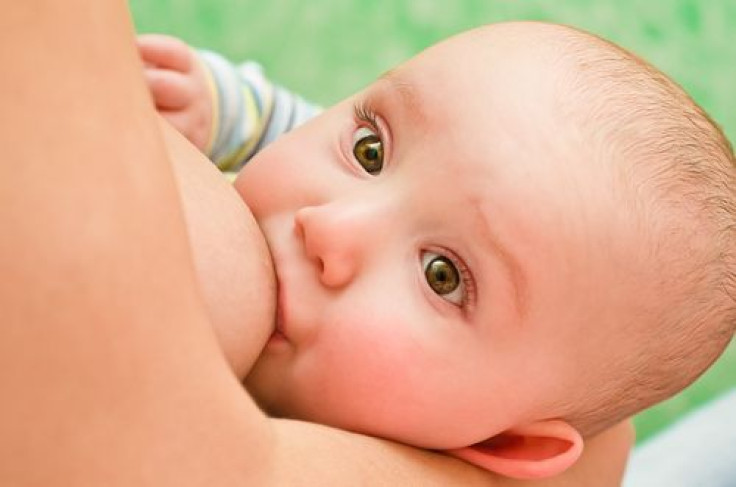 Mother breastfeeding baby