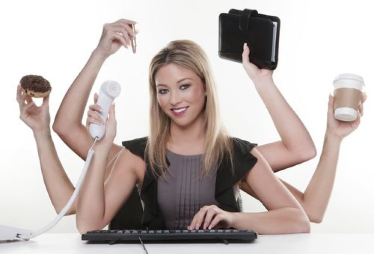 Woman with six arms multitasking her work and daily life