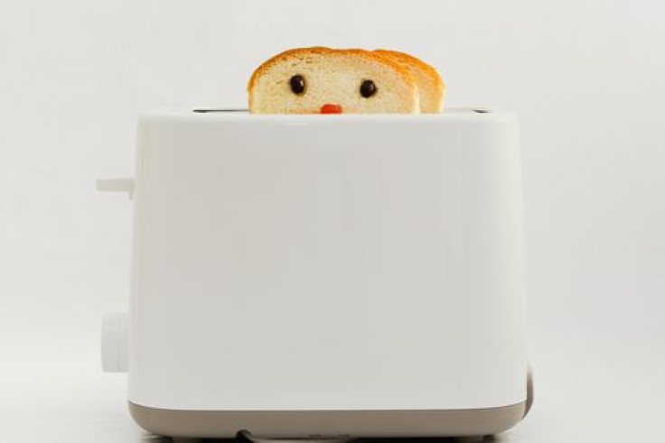 Bread coming out of toaster