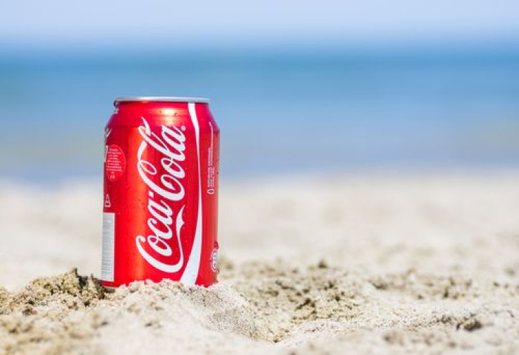 Coca-Cola can on sand 