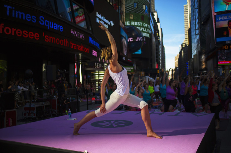 Thousands Strike A Pose At Yoga Event In Times Square