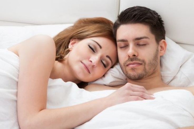 Couple sleeping on the bed