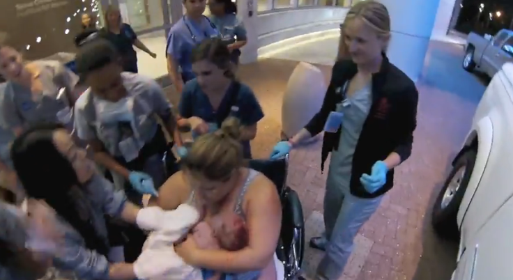 Woman gives birth outside hospital doors