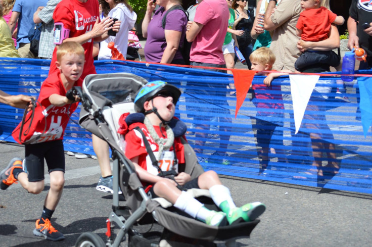 8-Year-Old Carries His Disabled Brother Through Triathlon [VIDEO]